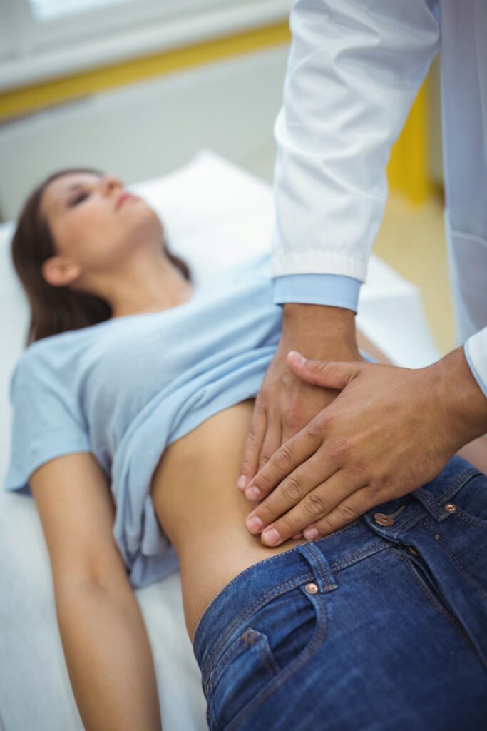 Pelvic Organ Prolapse 3 doctor examining the stomach of a female patient 2025 04 03 11 56 37 utc