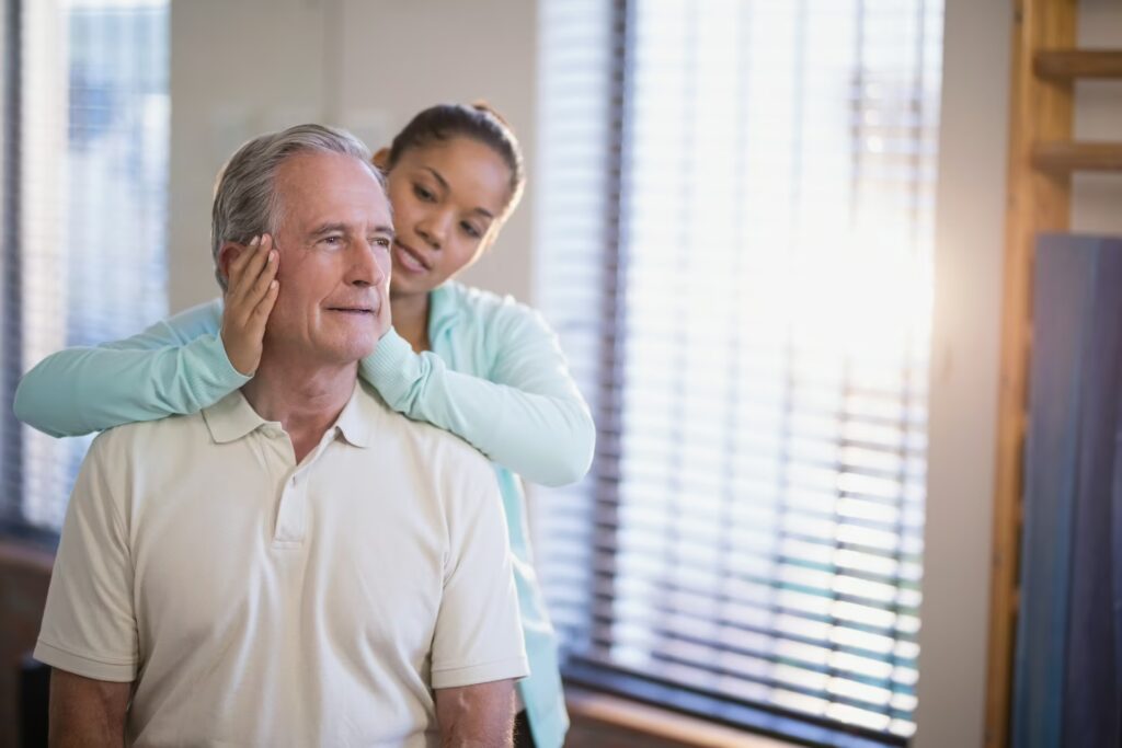 Chronic Pain 3 senior male patient receiving neck massage from fe 2025 04 03 13 28 06 utc