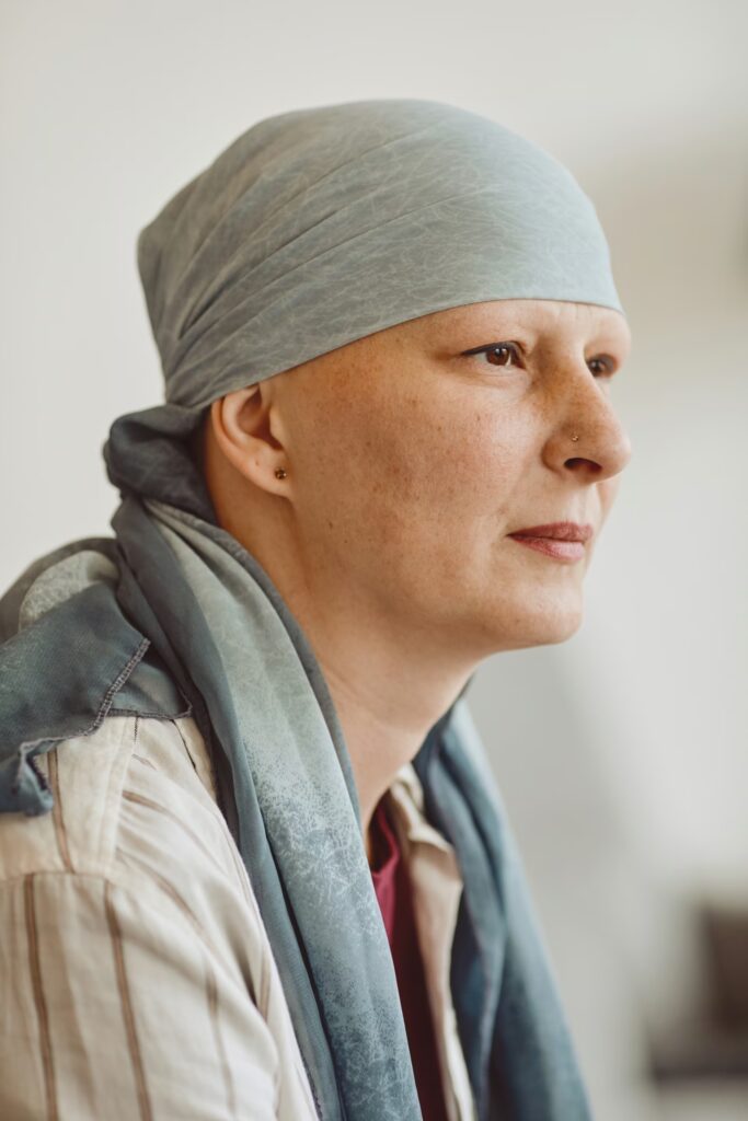 Cancer Care 3 side view at bald woman wearing headscarf 2025 03 05 20 22 36 utc